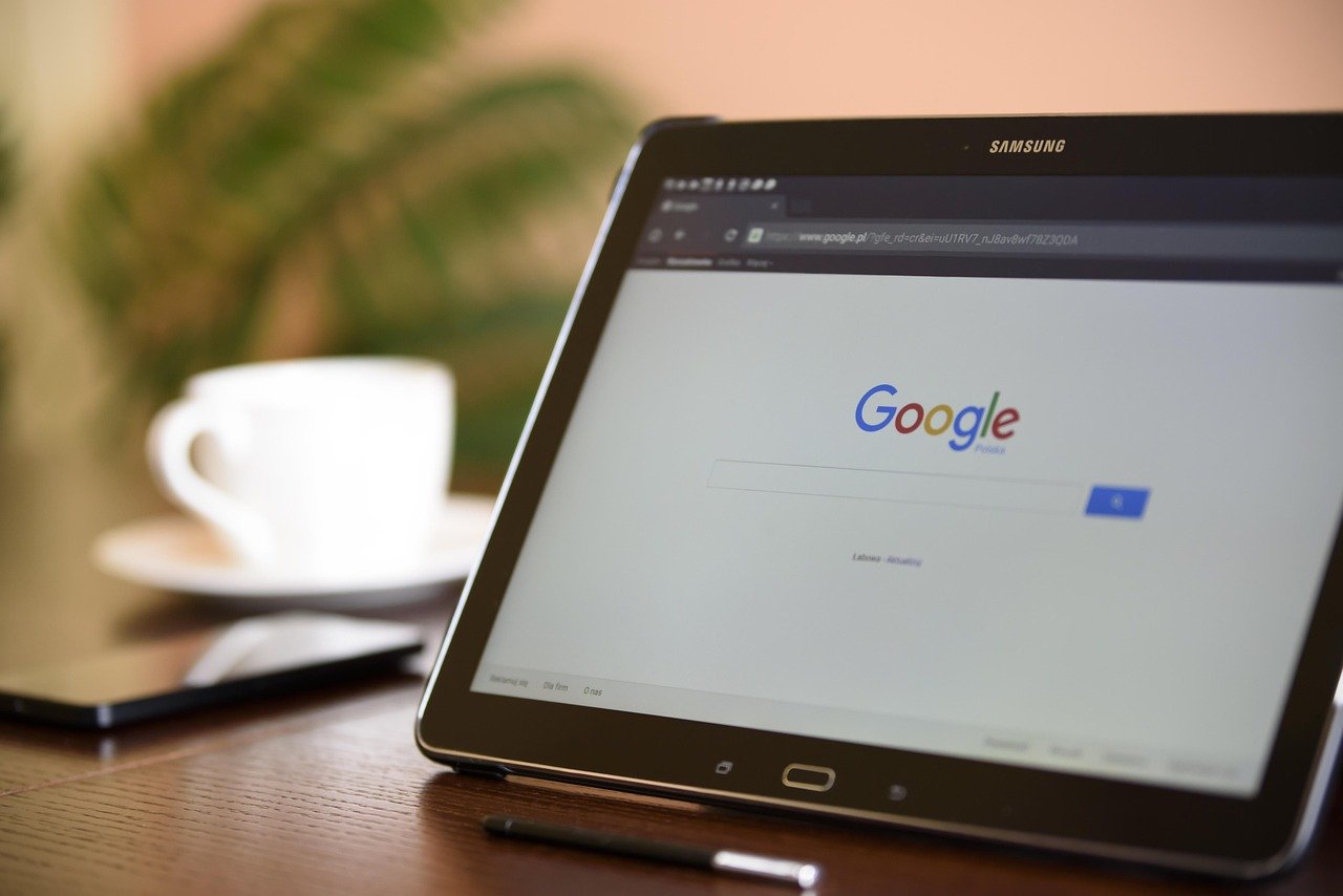 Google search open on a tablet on a desk